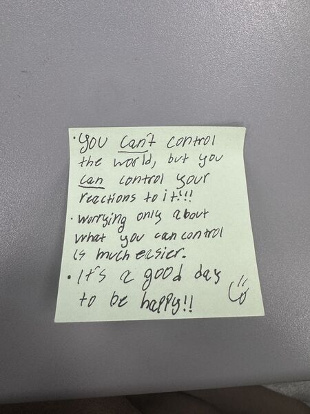 Handwritten sticky note with words of encouragement
